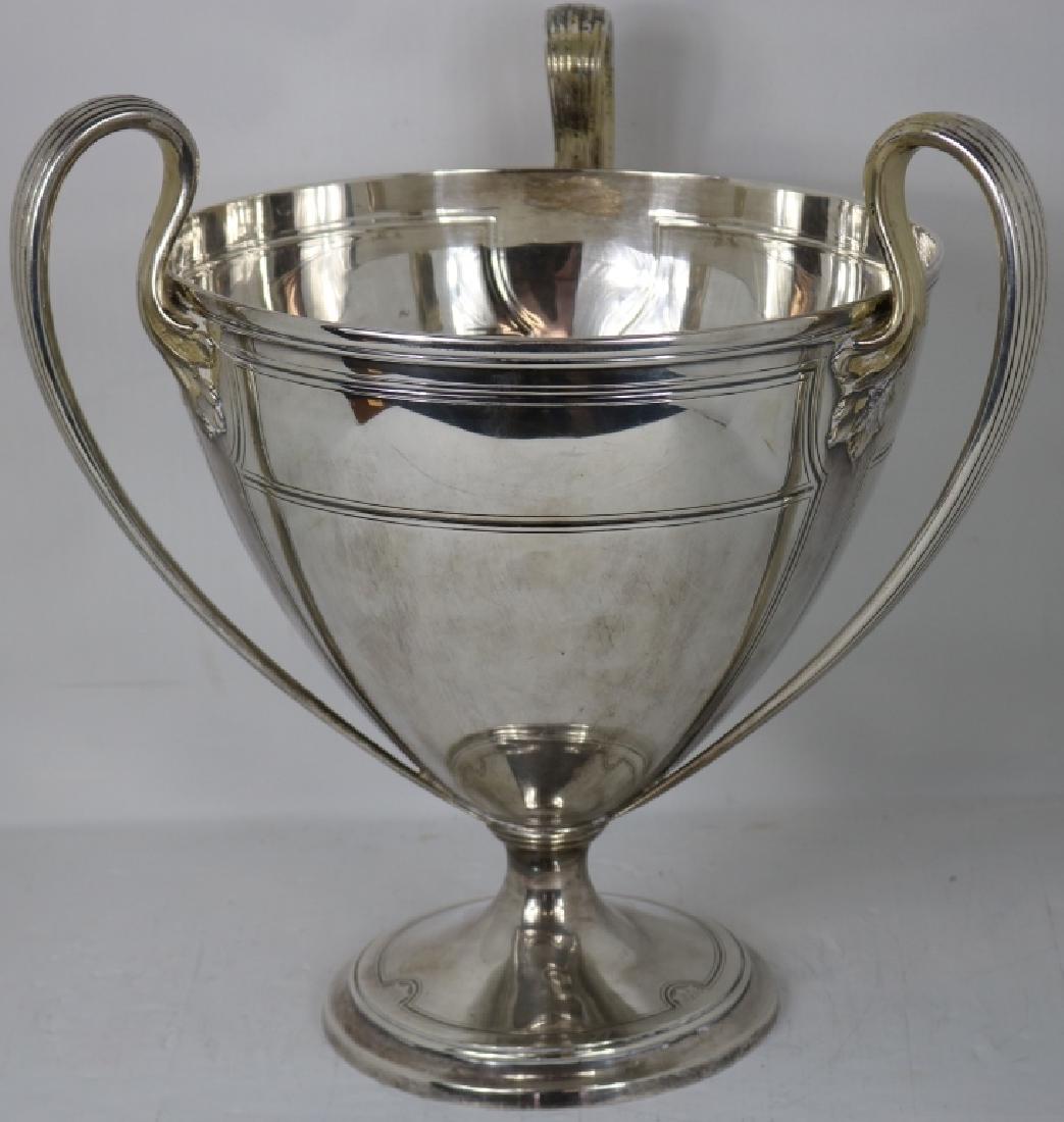 MONUMENTAL TIFFANY STERLING SILVER LOVING CUP: TROPHY FOR "SONS OF HOPE FOUNDERS CUP", 16 1/2" HIGH X 15 3/4" WIDE 13" DIAMETER; SHOWS SLIGHT BENDING TO BASE, HANDLES SHOW WORN GILDED FINISH, NOT WEIGHTED; 175.54 TROY OUNCES.