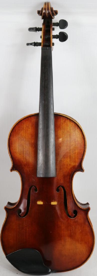 VIOLA, EARLY 20TH C GERMAN, 15 5/16" LENGTH OF: BACK, FIGURED MAPLE. UPPER BOUT 7 1/4", CENTER BOUT 5", LOWER BOUT 9". ALONG WITH A NICKEL SILVER MOUNTED BOW, 29" LONG, NOT SIGNED, IN FITTED CASE.