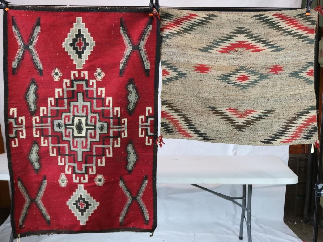 2 NAVAJO PIECES FROM 1ST QTR OF 20TH C. ONE IS: A SMALL RUG AND HAS A RED FIELD WITH GEOMETRIC DESIGN, 34" X 52". THE OTHER IS A SADDLE BLANKET WITH GRAY FIELD, 33" X 28 1/2".