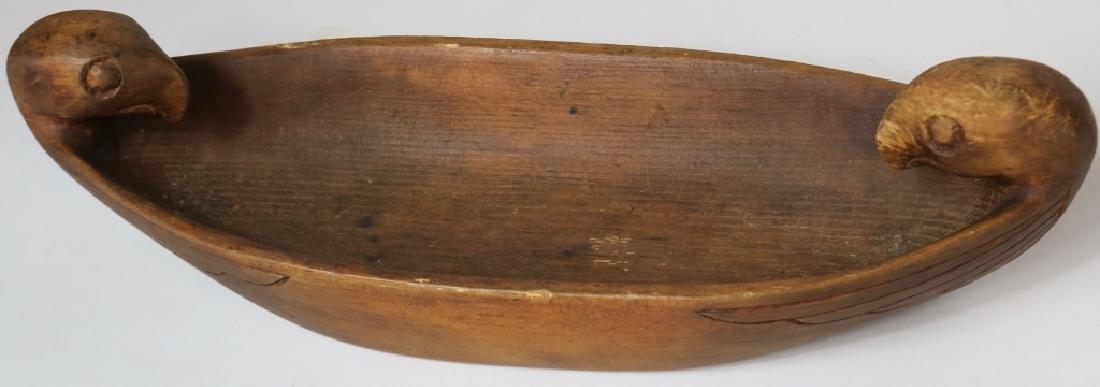 EARLY 20TH C NORTHWEST CARVED CEDAR BOWL WITH: CARVED EFFIGY HANDLES. 4 1/2" HIGH, 16" WIDE, 5 3/4" DEEP.