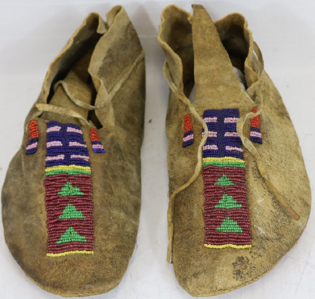 PAIR OF 19TH C CENTRAL PLAINS INDIAN BEADED: MOCCASINS, 10 1/4" LONG, GOOD CONDITION.