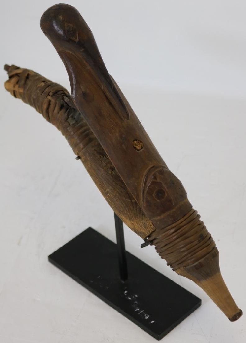 EARLY 19TH C TLINGIT NORTHWEST COAST HALIBUT: HOOK, WOOD AND IRON, CARVED ANIMAL FIGURES. GOOD ORIGINAL CONDITION. MISSING LOWER WRAP. ON CUSTOM MADE STAND. 10 1/2" X 5 1/2".