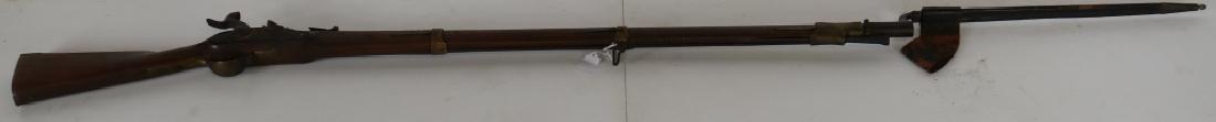 EARLY 19TH C PERCUSSION MUSKET WITH BAYONET AND: ORIGINAL SCABBARD, MODEL 1835, OVERALL GOOD CONDITION. BARREL LENGTH 41", 76" LONG WITH BAYONET, 13/16 BORE, LOCK WORKS. BAYONET IS OLD BUT MAY NOT BE ORIGINAL.
