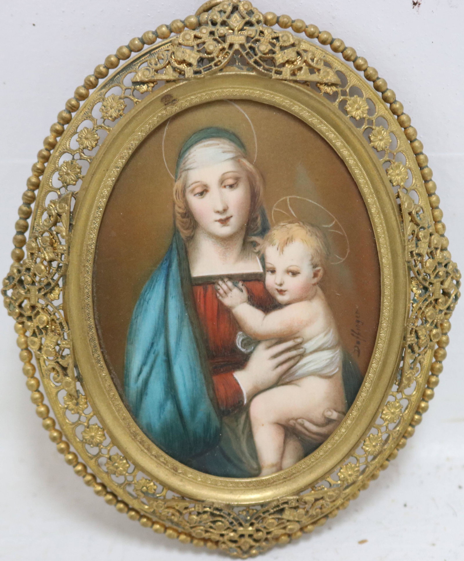 MINIATURE PORTRAIT PAINTING OF THE MADONNA: AND CHILD, EARLY OR MID-19TH C. SIGNED "DAFFINGER" (POSSIBLY MORITZ MICHAEL DAFFINGER, 1790-1849). OVAL. IN A PIERCED BRASS FRAME. SIGHT SIZE 3 1/4" X 2 1/4, OVERALL 4 1/2" X 3 3/4".