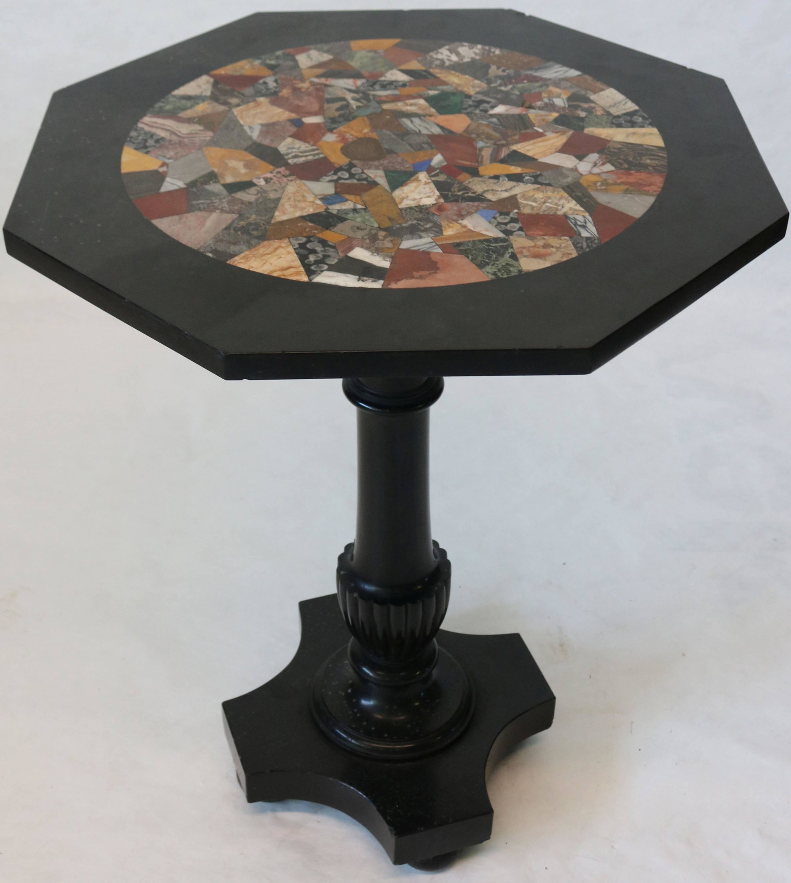 LATE 19TH CENTURY CARVED AND TURNED MARBLE: OCTAGONAL TOP TABLE WITH ROUND INLAID SPECIMEN STONE TOP. URN SHAPED SHAFT. GOOD ORIGINAL CONDITION. 31" HIGH, 24" X 24". MINOR CHIPS TO EDGE.