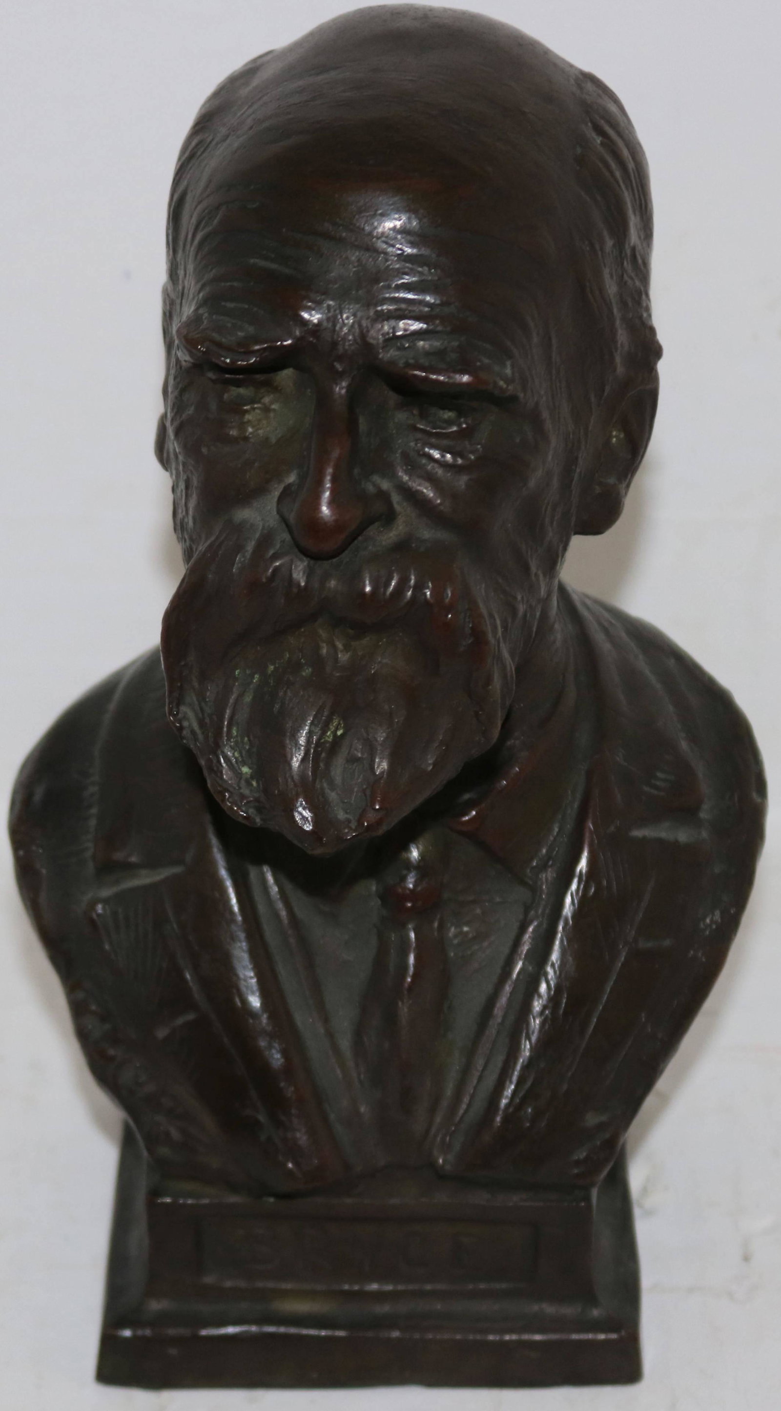 HENRY BUSH BROWN (1857-1935, NY) BRONZE BUST OF: EBENEZER BRYCE, A MORMON PIONEER. BEST KNOWN AS THE PERSON FOR WHOM BRYCE CANYON NATIONAL PARK WAS NAMED. STAMPED GORHAM FOUNDRIES. SIGNED BROWN AND DATED APRIL 24, 1913. 9 1/4" X 5 1/4" X 5".