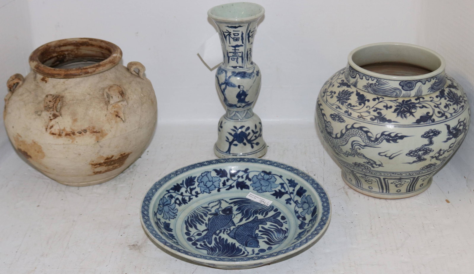 LOT OF FOUR 18TH CENTURY STYLE CHINESE: POTTERY/PORCELAIN OBJECTS. 20TH CENTURY. TO INCLUDE: 1) VASE WITH DRAGON DESIGN 8 1/2" HIGH. 2) BALUSTER FORM VASE 10 1/2" HIGH. 3) BOWL WITH FISH DESIGN 11" DIAMETER. 4) HANGING POT WITH DRAGON DESIG