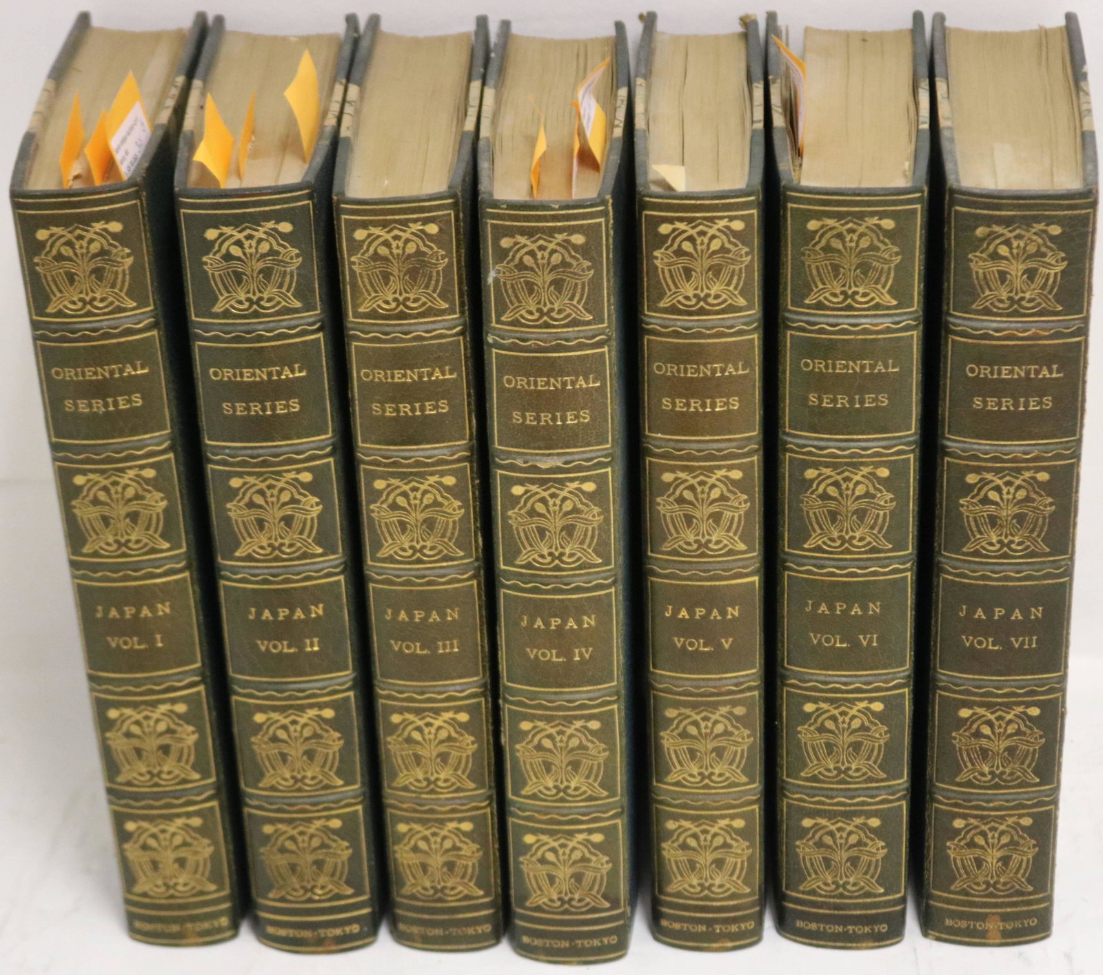 ORIENTAL SERIES "JAPAN AND ITS HISTORY, AND ITS: LITERATURE" PARTIAL SET CONSISTING OF VOLUMES 1-7. BLUE CLOTH MOROCCO BINDING WITH GILT-TOOLED SPINES, MARBLED BOARDS, AND END PAPERS. 8VO WITH HAND COLORED FRONTISPIECE ON SILK IN EACH VOLUME. HAND C