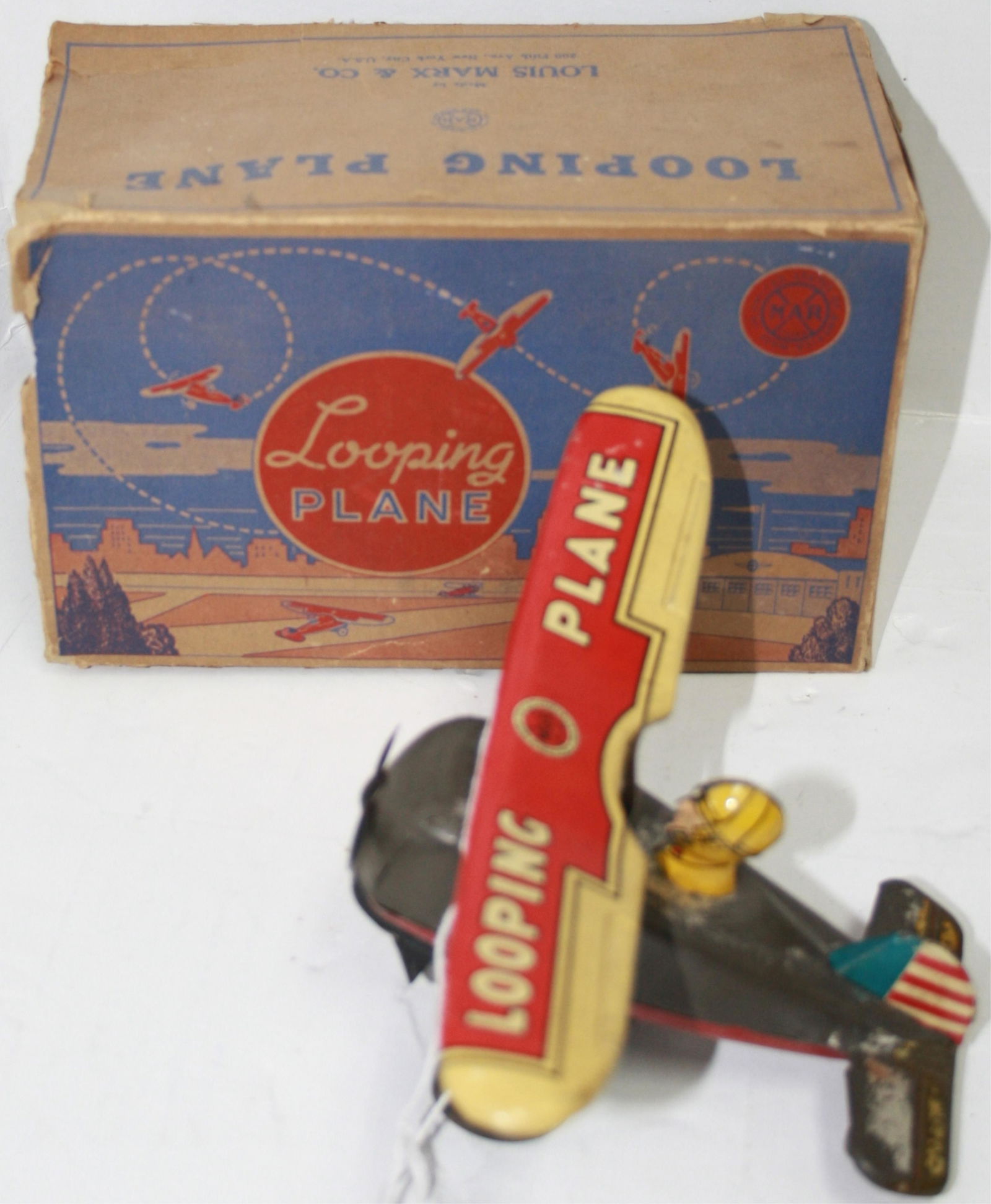 TIN LITHOGRAPH WIND-UP TOY BY MARX. "LOOPING (1 of 4)