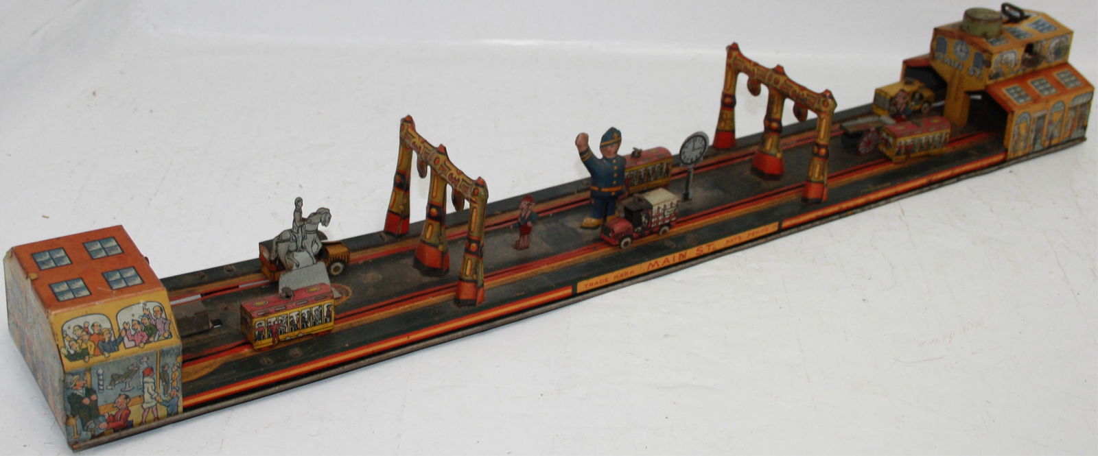 MARX "MAIN STREET" TIN LITHOGRAPH WIND-UP TOY. (1 of 6)