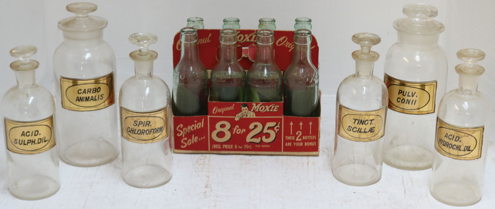 LOT OF 14 EARLY-MID 20TH CENTURY GLASS BOTTLES. (1 of 2)
