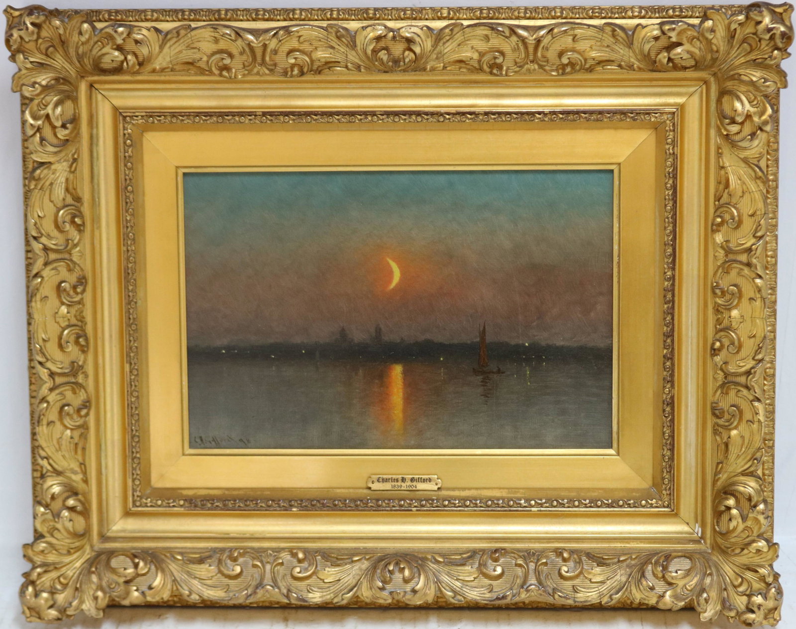CHARLES HENRY GIFFORD, (FAIRHAVEN ARTIST, C. H.: GIFFORD, 1839-1904) OIL PAINTING ON CANVAS. DEPICTS NEW BEDFORD HARBOR WITH LUMINIST SKY WITH FAIRHAVEN SKYLINE IN THE DISTANCE. SIGNED LOWER LEFT, DATED 1898. SIGHT SIZE 8 1/4" X 12". OVERALL 16" X 1