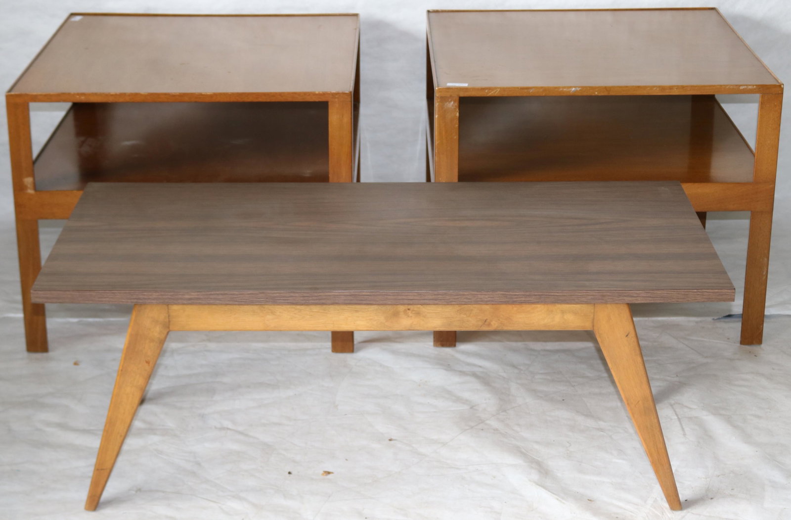THREE MID-CENTURY TABLES. TO INCLUDE: A PAIR OF: SQUARE DUNBAR END TABLES, NO 3378. IN AMBER MAHOGANY FINISH. 22 1/4" HIGH, 27" X 27" TOPS. SIGNED ON BOTTOM WITH ORIGINAL FORMICA TOP, 17" HIGH, 44" WIDE, 21" DEEP. END TABLES SHOW SOME WEAR AND SCUFF