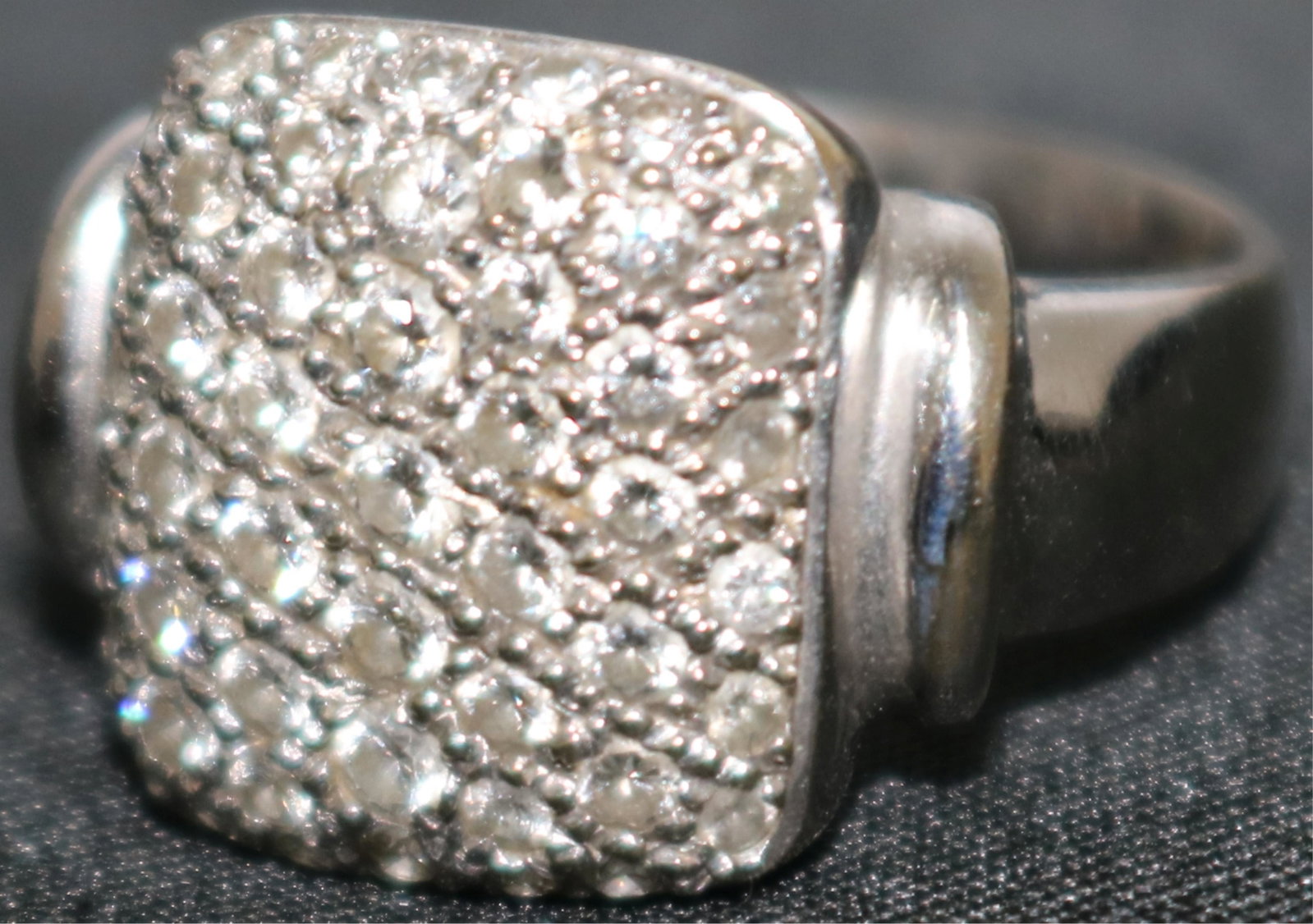 18KT WHITE GOLD RING, SQUARE MOUNT PAVE SET WITH: SMALL DIAMONDS, SIZE 7, 4.1 DWT INCLUSIVE.