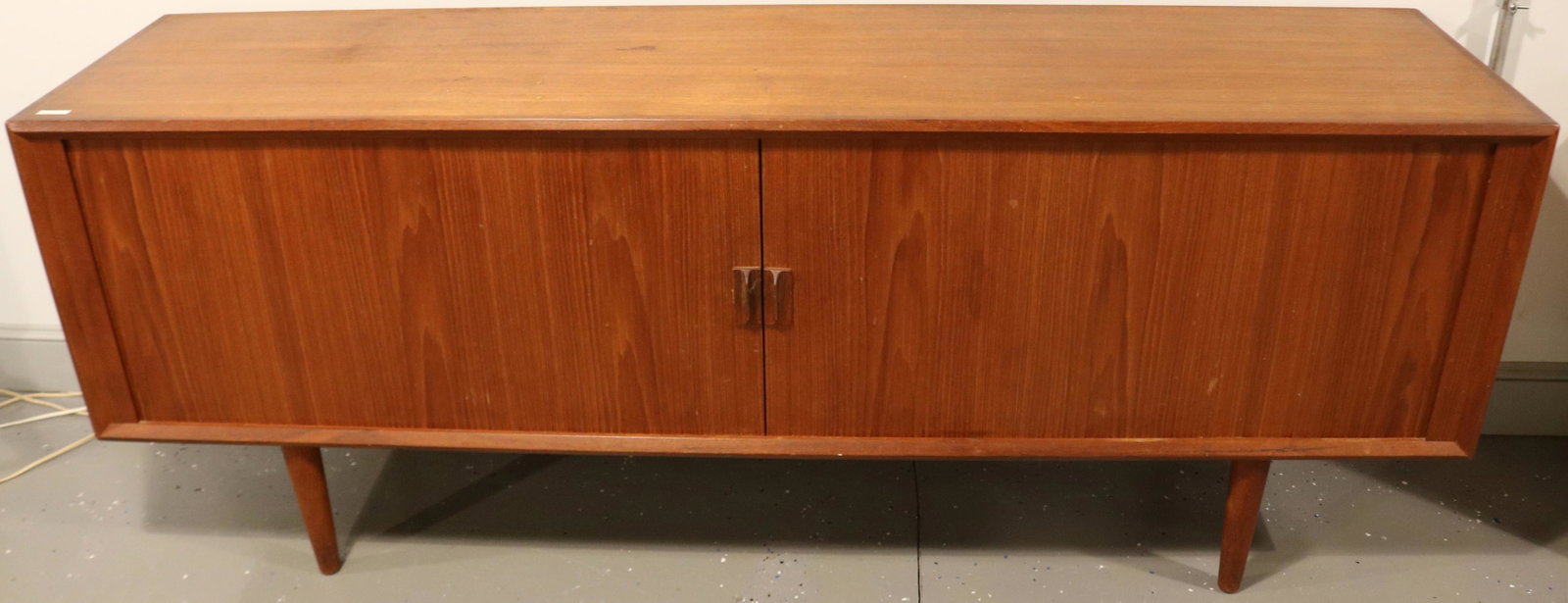 MID-CENTURY MODERN DANISH SIDEBOARD, INTERIOR: WITH SHELVES AND DRAWERS. TWO TAMBOUR DOORS. 31 1/2" HIGH, 80" WIDE, 19 1/4" DEEP. POSSIBLY BY POUL HUNDEVAD. DANISH CONTROL BRAND LOCATED ON THE INSIDE OF THE TOP DRAWER.