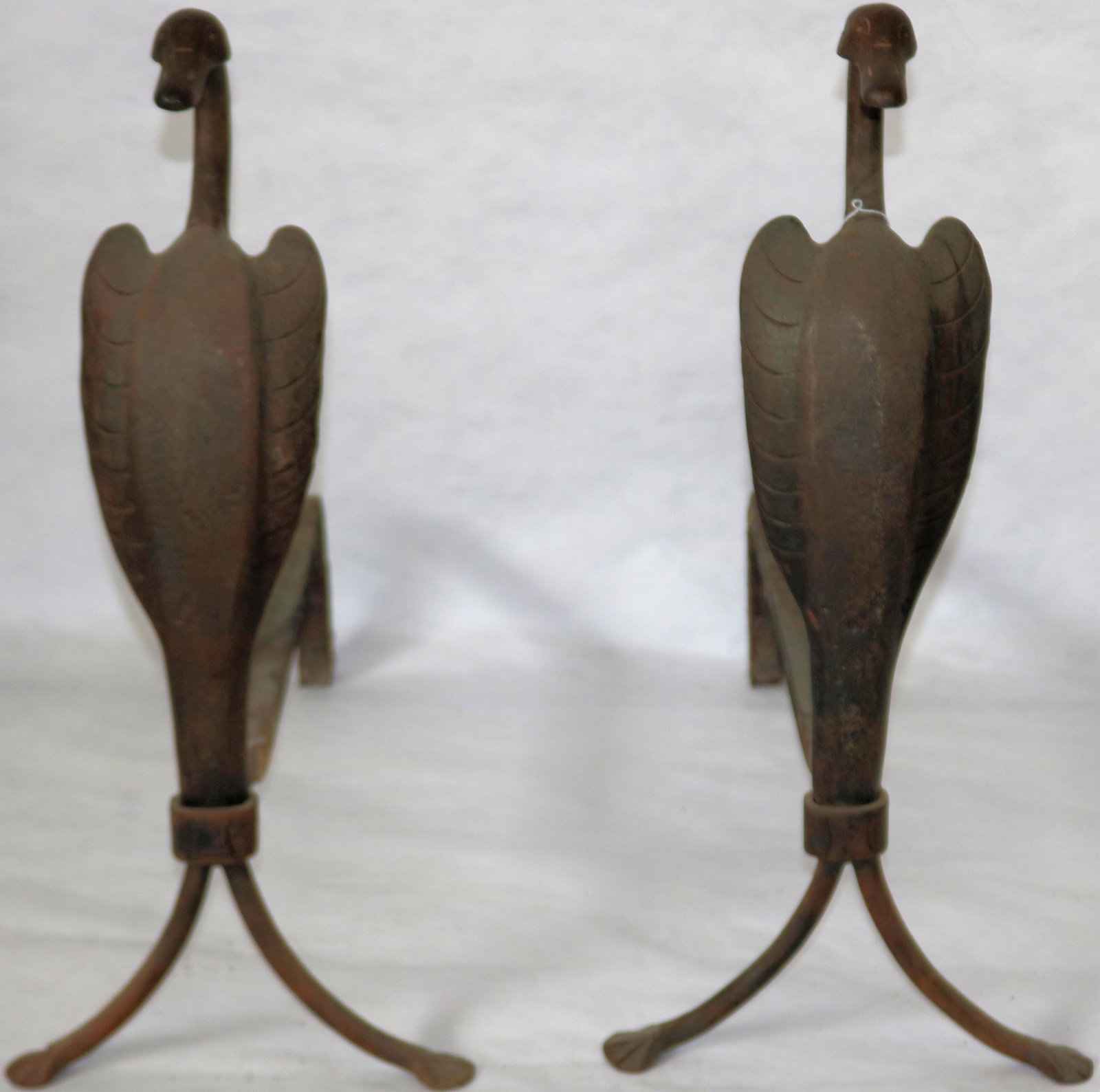 PAIR OF WROUGHT IRON ARTS AND CRAFTS ANDIRONS.: BIRD FORM. 20" HIGH, 9" WIDE, 19" DEEP.