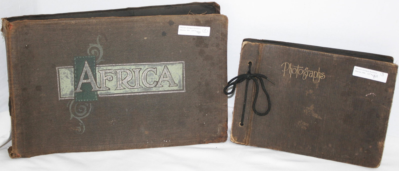 LOT OF TWO WORLD WAR I PHOTO ALBUMS, DOCUMENTING: THE WAR IN AFRICA, 1915-17. THE PHOTOGRAPHS WERE LIKELY TAKEN BY A BRITISH OFFICER SERVING IN THE ROYAL ENGINEERS. THEY DOCUMENT SCENES FROM MODERN-DAY MALAWI, UGANDA, MOZAMBIQUE, SOUTH AFRICA, RWANDA