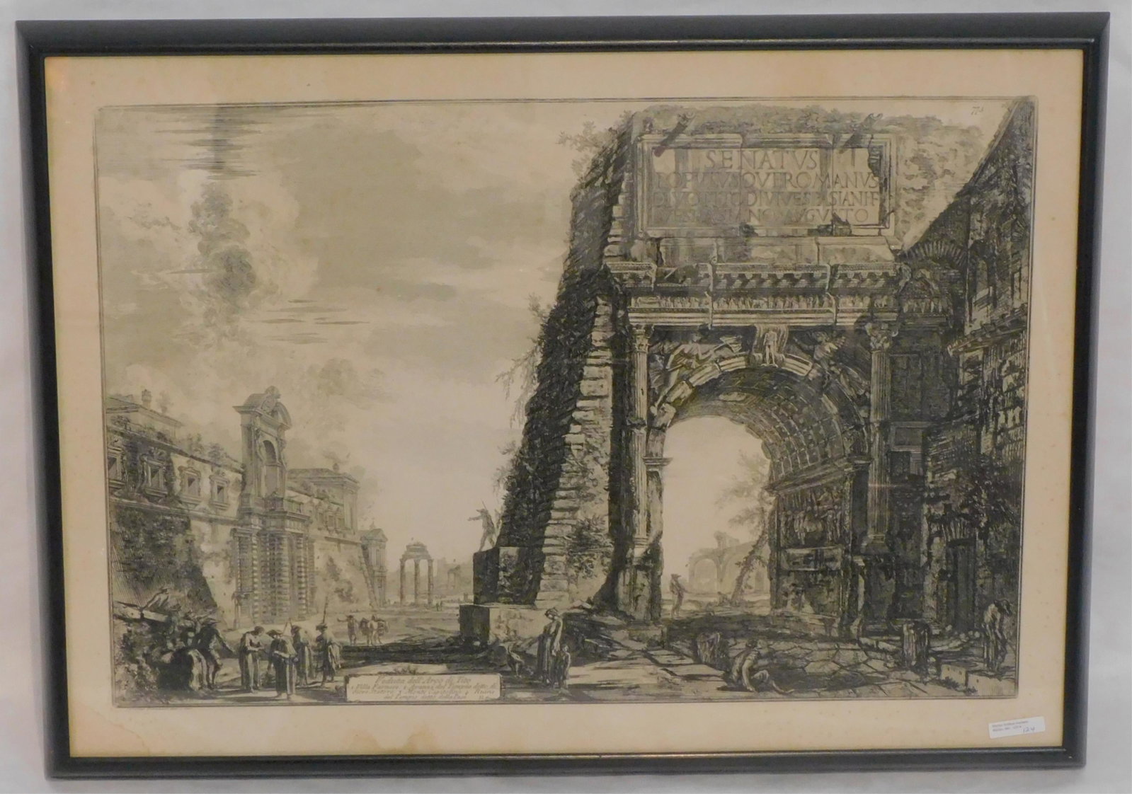 Giovanni Battista Piranesi (1720-1778, Italy): framed and glazed black and white etching, titled "Veduta dell' Arco di Tito". Depicts the Arch of Titus in Rome. Sighed lower left Cavalier Piranesi del e inc. Numbered 775 23 in the upper right. Pos