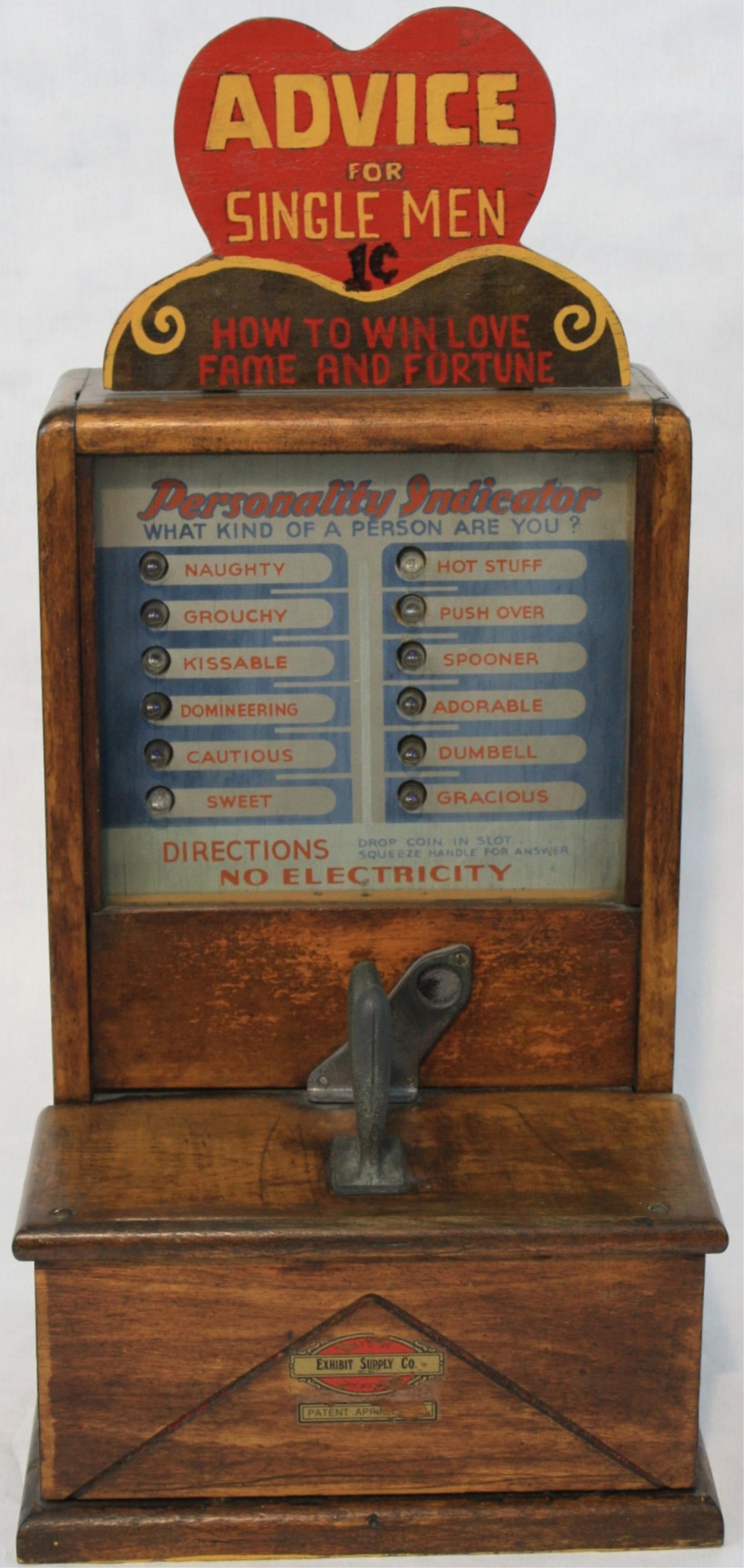 "Advice to Single Men" coin operated penny: novelty machine, ca. 1920. Maple case. Converted to electricity. Currently in working condition. 24" high, 11" wide, 9 1/2" deep. This device tells a man what kind of person he is, he can be: naughty,
