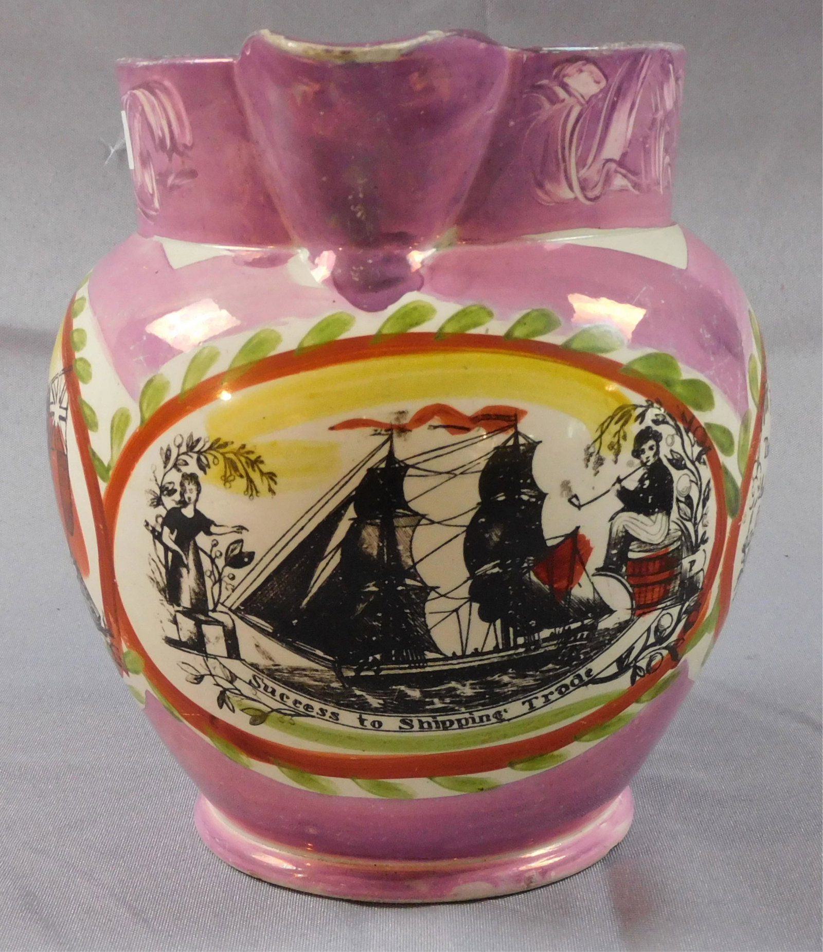 Sunderland lustreware pitcher, 19th c., English.: Success to the Shipping trade. Depicts a ship with sailor and sweetheart, as well as verses and mariner's compass. 7 1/2" high, 9" wide with handle. Good overall condition, has a small chip to foot.