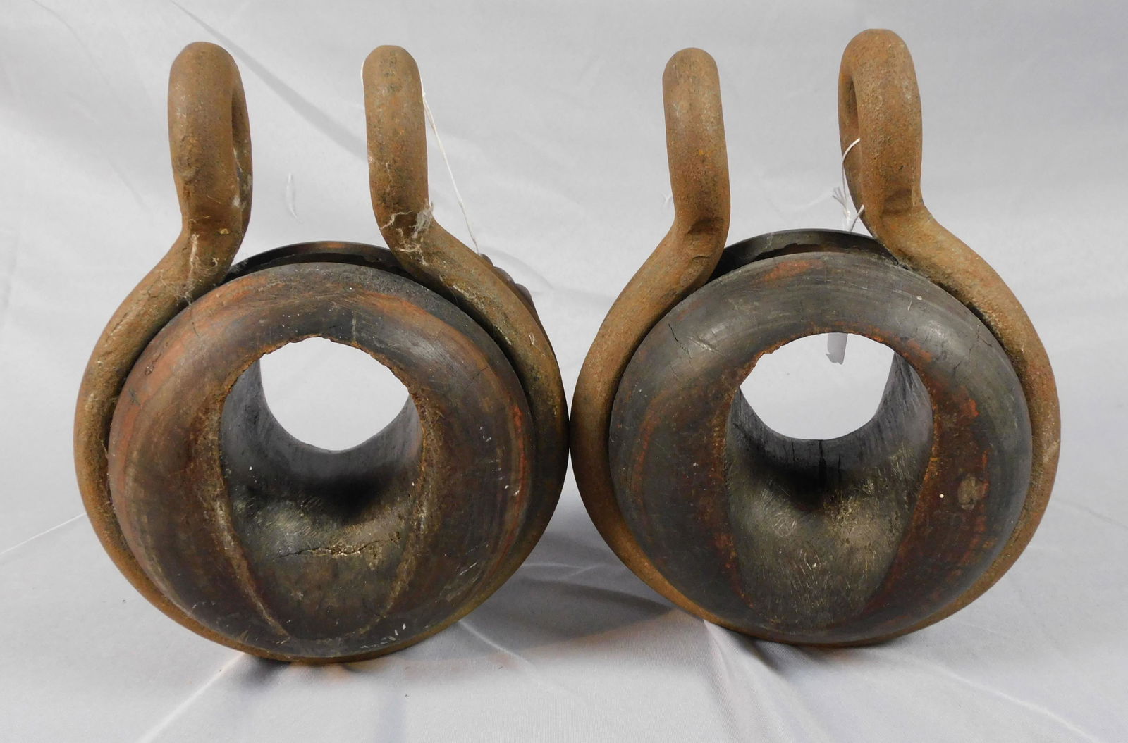 Pair of Lignum vitae and iron deadeyes, 19th c.: 11" high, 9" wide. Provenance: Webb estate.