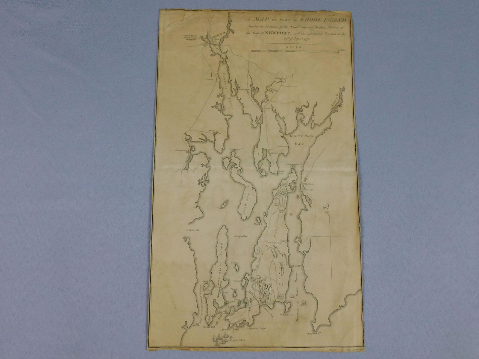 Rare map of the Battle of Rhode Island, dated: August 29, 1778. Drawn by Sabin Lewis. Engraved by Benjamin Jones, Philadelphia. Engraving, map shows the locations of the American and British armies in specific towns along Narragansett Bay, as well