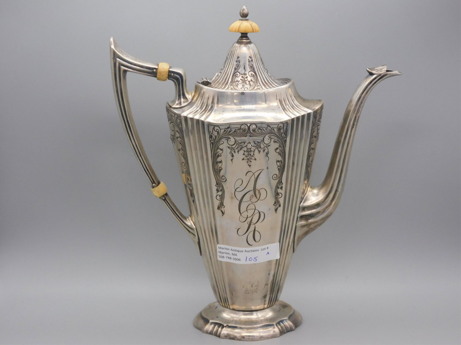 Shreve Crump and Low, sterling silver coffee pot,: ca. 1920. Has a bone finial and infusers. 9 1/2" high, 8" wide, 3" deep. 19.8 ozt.