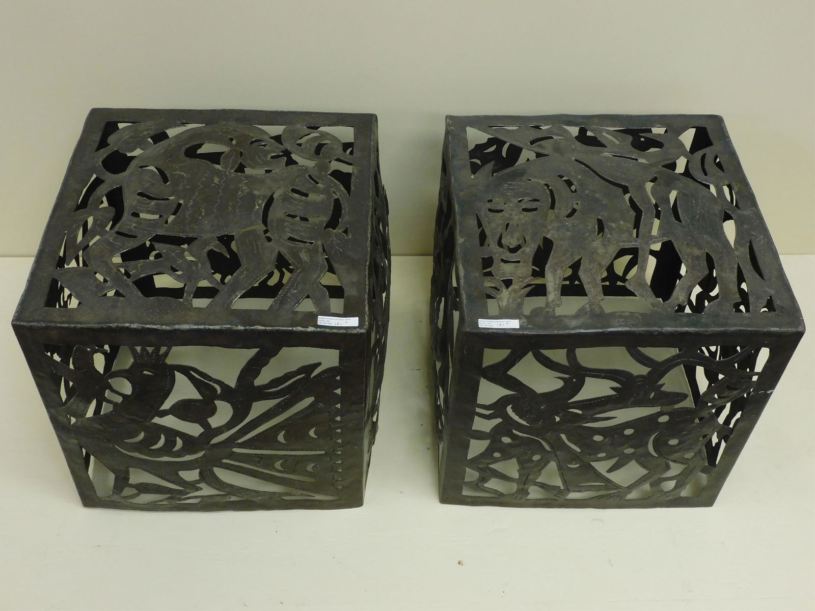Jean Pierre Bernard (20th c., Haiti) for Harvey: Probber, two torch-cut, welded and chased steel cubes. Made in Croix-des-Bouquets, Haiti, ca. 1960-70s. Made of recycled steel drums. Typical of Haitian folk art, these cubes feature motifs which incl
