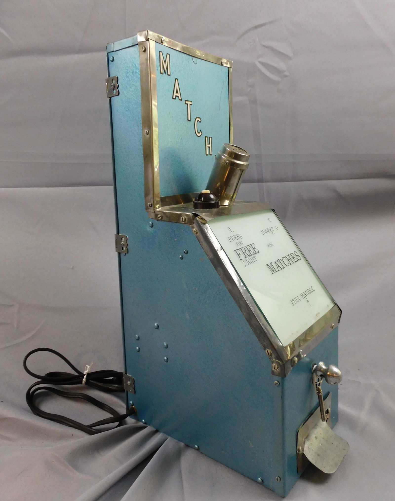 Coin operated matches vending machine with cigar