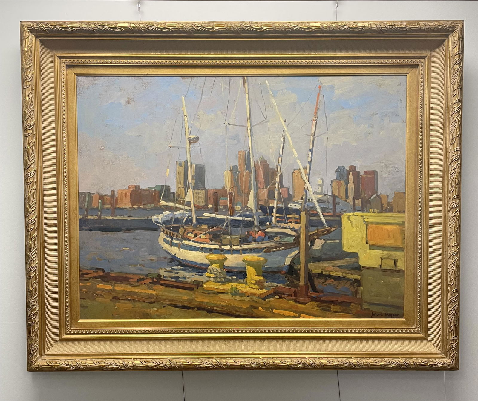 John C. Traynor (1961-, New Jersey, New York) oil: painting on canvas depicting Boston Harbor. Signed lower right. Boston School, elaborate carved and gilded frame. Sight size 29" x 39", overall with frame 41" x 55". Overall very good condition.