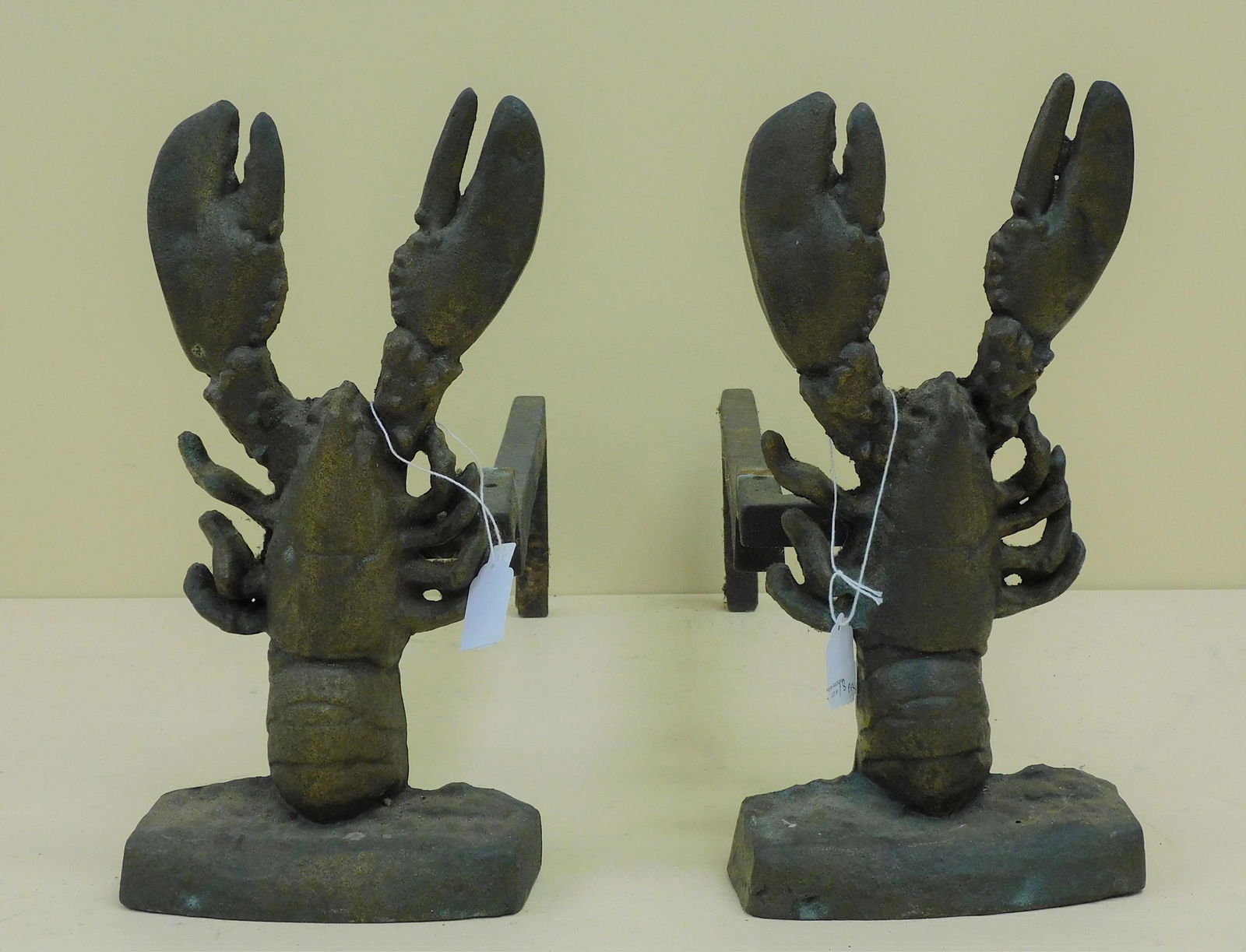 Whimsical lobster-form andirons, early 20th c.: Cast iron. 12 1/2" high, 6 1/4" wide, 20" deep. Overall excellent condition.