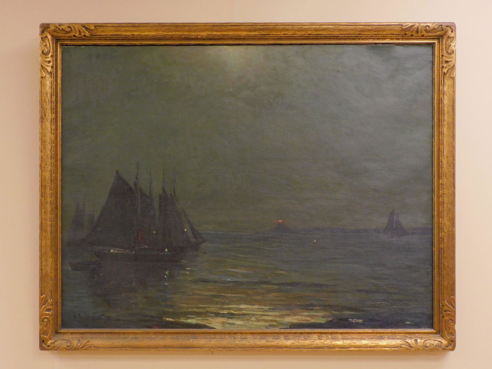 Charles Jay Taylor (1855-1929, NY) oil painting: on canvas, depicting a nocturnal harbor scene. Boothbay Harbor with lighthouse illuminated. Signed lower left. Sight size 32" x 41 1/2", overall period carved and gilded frame 37" x 45 1/4". Good orig