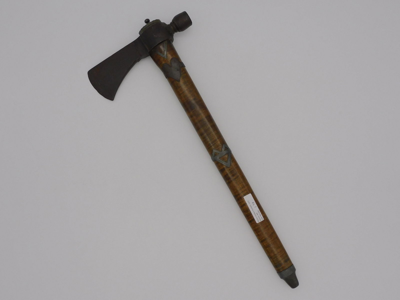 Native American pipe tomahawk. Pewter inlaid: handle. 19" long, 7 1/2" wide. Good overall condition.