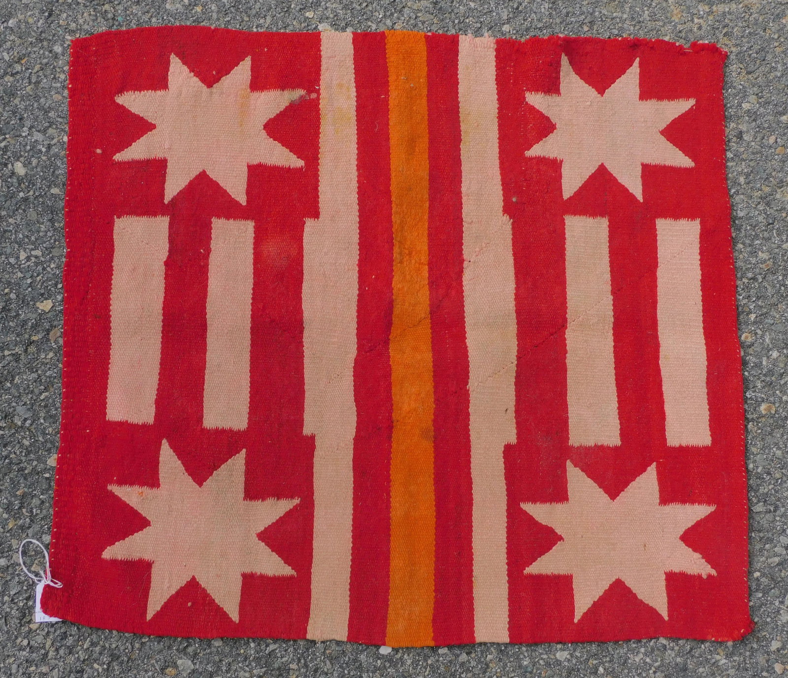Navajo Dine saddle blanket, ca. 1930. Stars and: bar design. 26" x 28". Shows some staining.