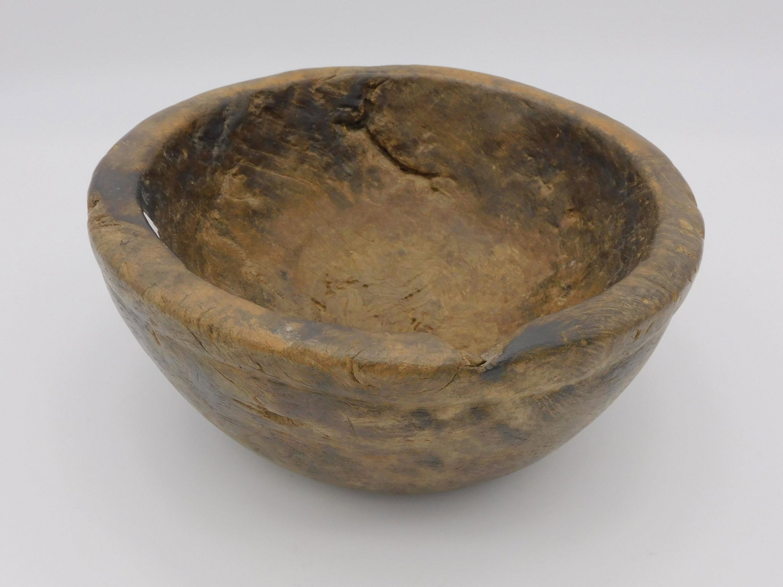 Early burl bowl, possibly Woodlands. Old dark: finish. 4 1/2" high, 9 1/2" diameter.
