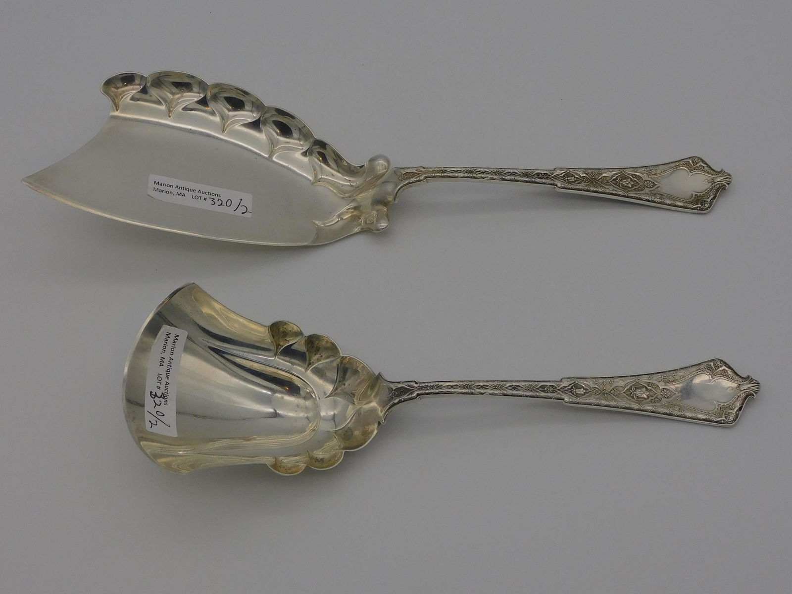 Pair of Tiffany & Co. sterling silver serving: pieces. Persian pattern. 7.22 total ozt.
