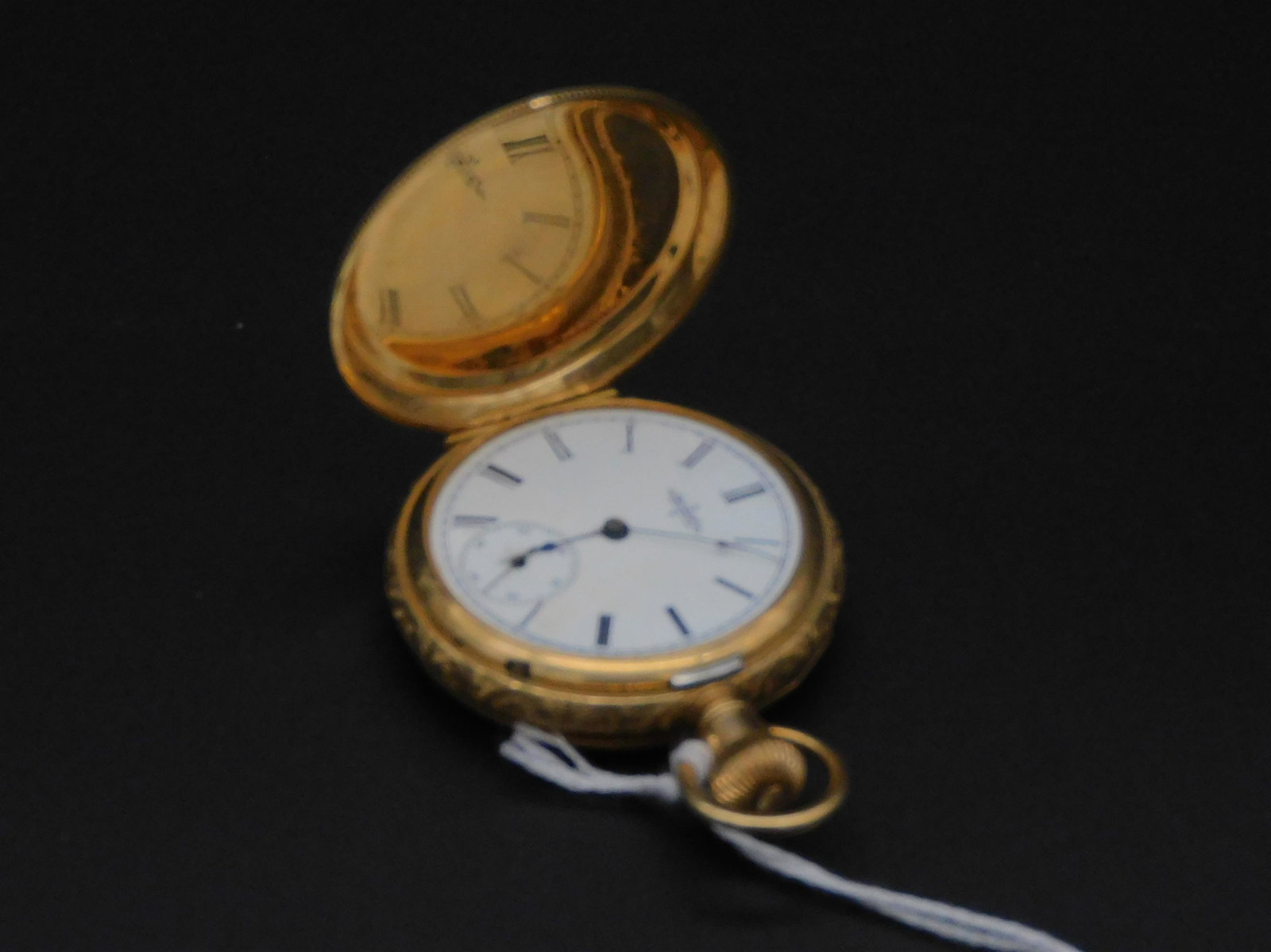 14kt gold hunter case ladies watch by Elgin.: Lever set. 1 5/8" diameter. 36.8 total dwt. In the original velvet and silk lined box. Not currently working.