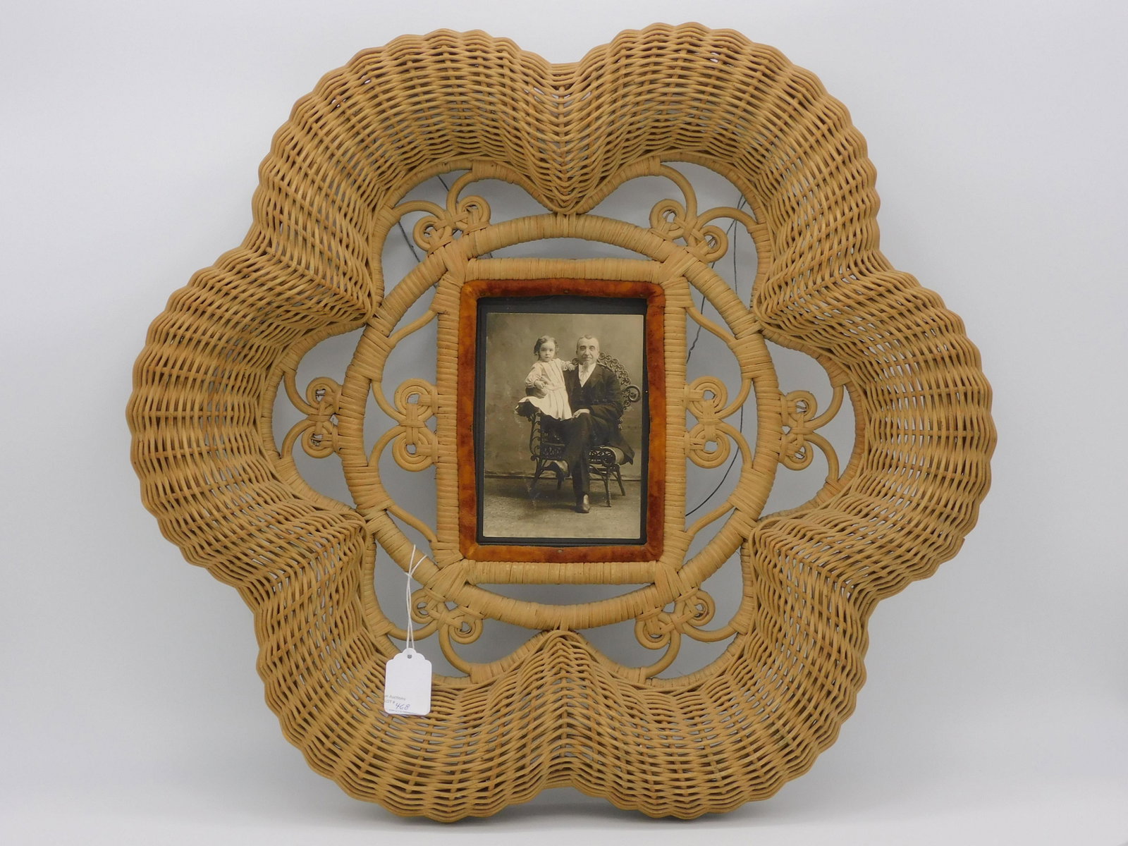 Victorian wicker frame, ca. 1890. Round hexagonal: rolled edge. Period photograph in center. Original natural finish. 20 1/2" diameter, 2 1/2" deep. Provenance: Mary Jean McLaughlin Collection. Featured in the Smithsonian Exhibition at the Renwick Gal