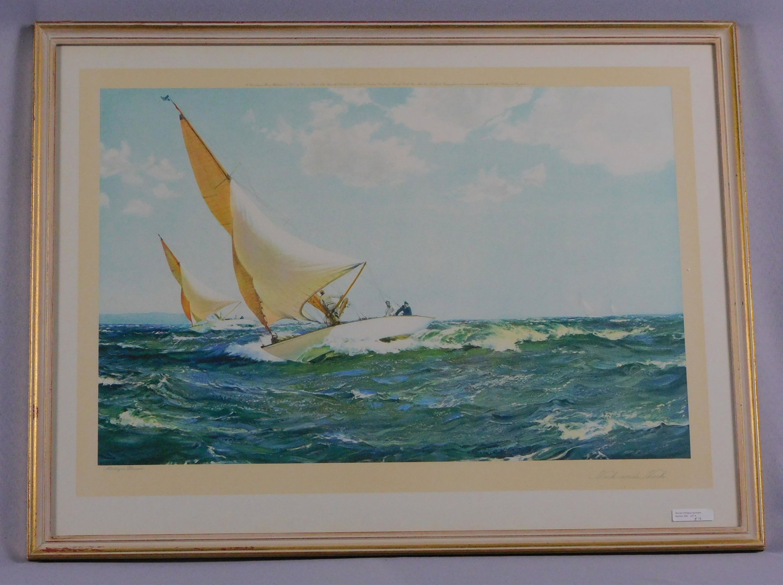 After Montague Dawson (1890-1973, British) framed: colored lithograph titled "Neck and Neck". Signed lower left. Published in 1935 by Frost and Reed Litho, London. Sight size 19" x 27 3/4", overall with frame 23 1/2" x 31".