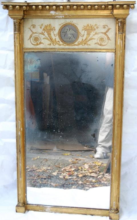 19TH CENTURY CLASSICAL TABERNACLE GILT MIRROR: WITH UNUSUAL PAINTED CANVAS PANEL AT TOP DEPICTING A BIRD WITH SNAKE IN MOUTH AND CORNUCOPIA DESIGN, NEEDS GILT AND GESSO RESTORATION, 52 3/4" HIGH, 30 1/4" WIDE, 4 1/2" DEEP