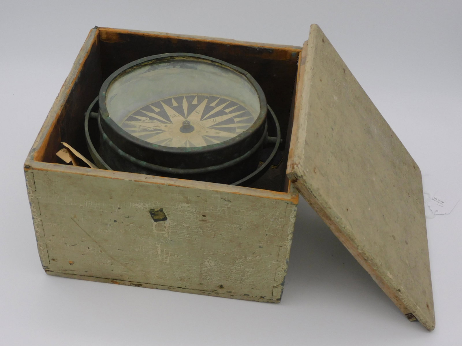 Walter Folger Jr., Nantucket, boxed dry boat: compass, late 18th c. Brass gimbaled compass with paper dial, signed Walter Folger Jr. Nantucket. Compass diameter is 6 7/8", approx. 4 1/4" high. House in its original painted dovetailed box with cov