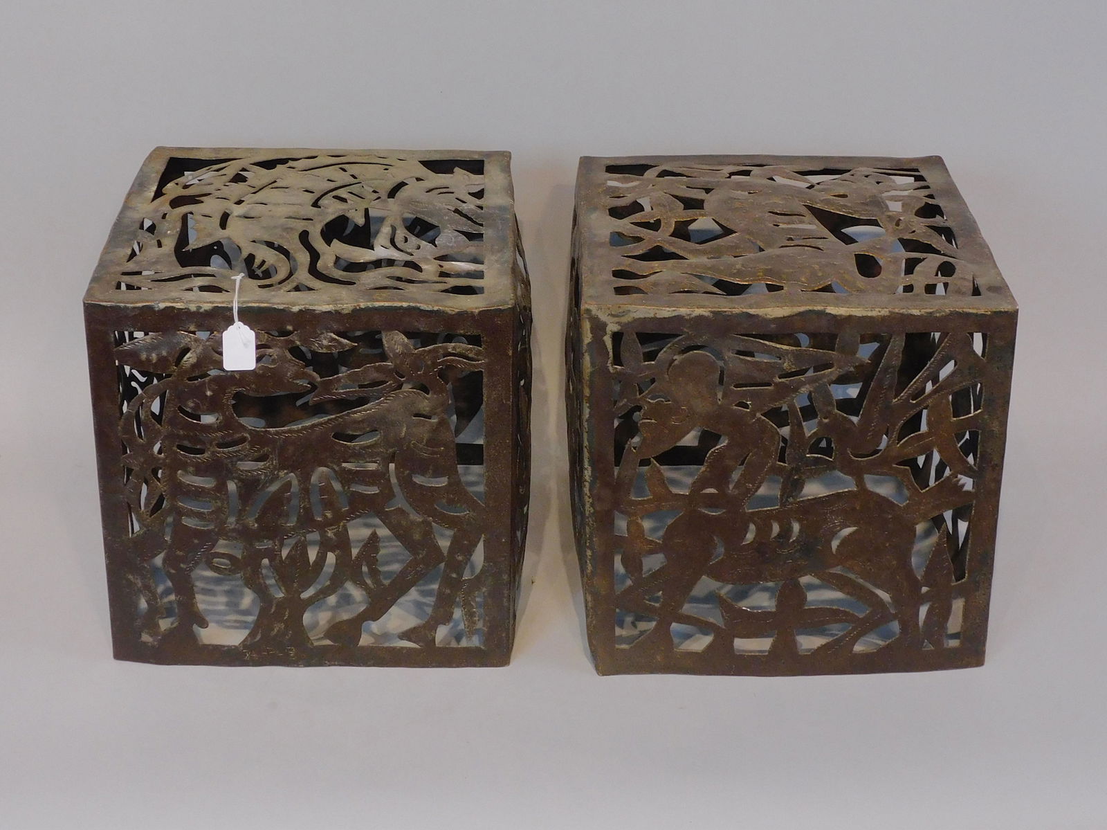 Jean Pierre Bernard (20th c., Haiti) for Harvey: Probber, two torch cut, welded and chased steel cubes. One is signed. Made in Croix-des-Bouquets, Haiti, ca. 1960s-70s. Made of recycled steel drums. Typical of Haitian folk art, these cubes feature m