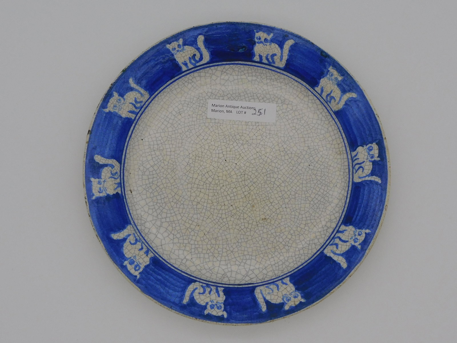 Rare early Dedham Pottery plate, repeating cat: border. 7 1/2" diameter. It was exhibited at the Dedham Historical Society and Museum. 1" high.