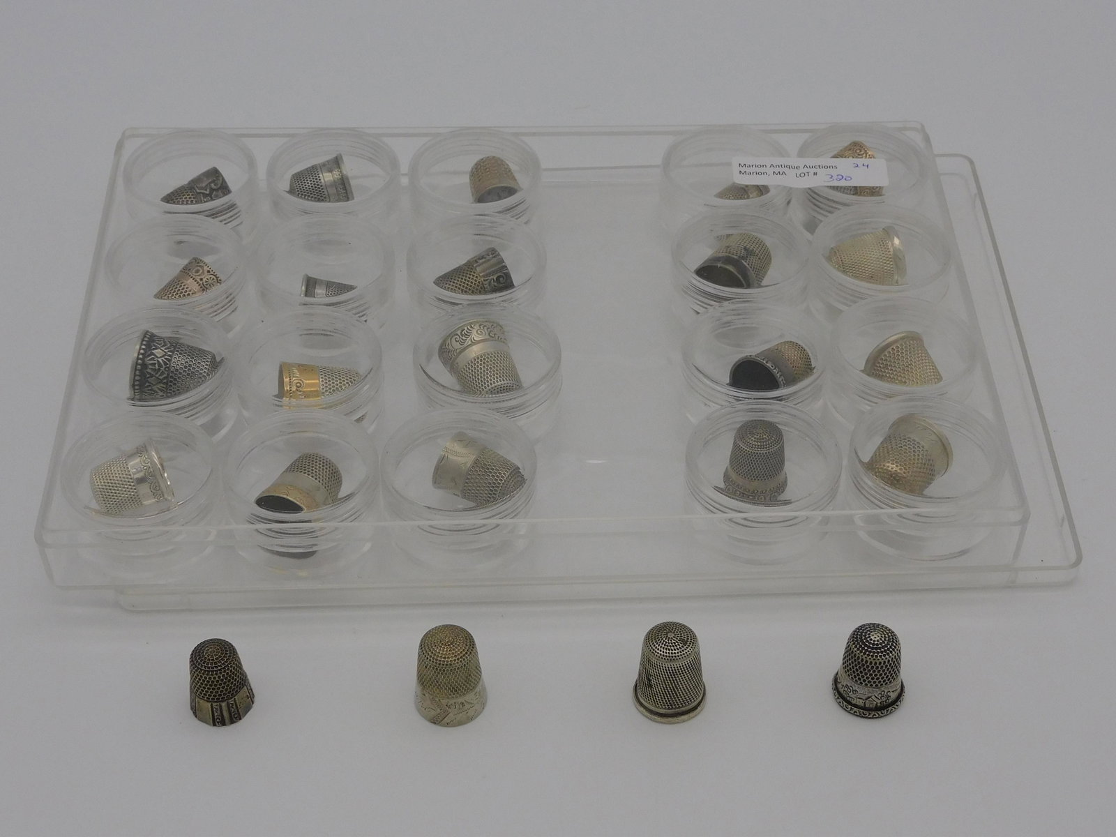(24) silver thimbles. 20 are marked sterling, 4: are not marked (of the four, one is definitely silver plate). English and American, in fitted cases. Ranging in size.
