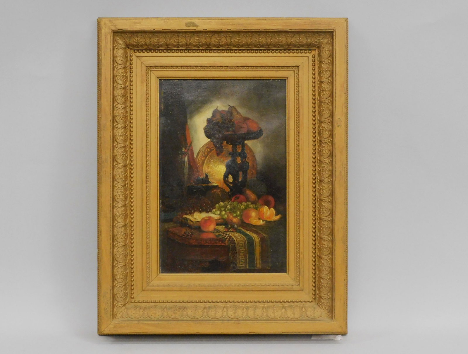 George William Whitaker (1841-1916, RI, MA, NY): oil painting on canvas, still life with fruit on a table. Signed lower right. Sight size 12" x 8", overall in original carved frame 19" x 15 1/8". Also signed on the stretcher. Good, untouched origina