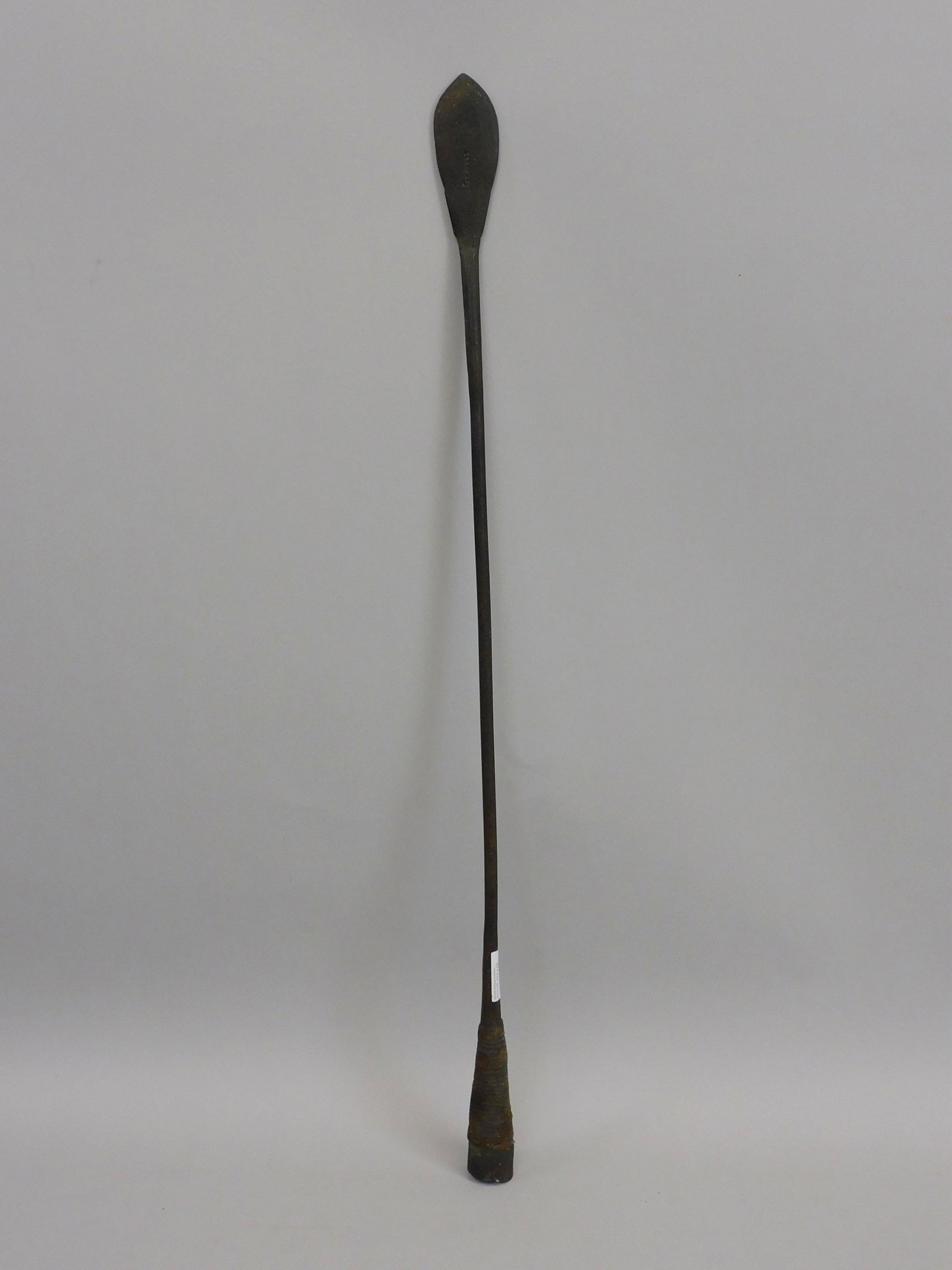 Rare signed whaling lance. 19th century. The: lance is marked Peters and cast steel. It was made by Ambrose J. Peters of New Bedford, Massachusetts. It retains its original rope binding. 36". Good condition