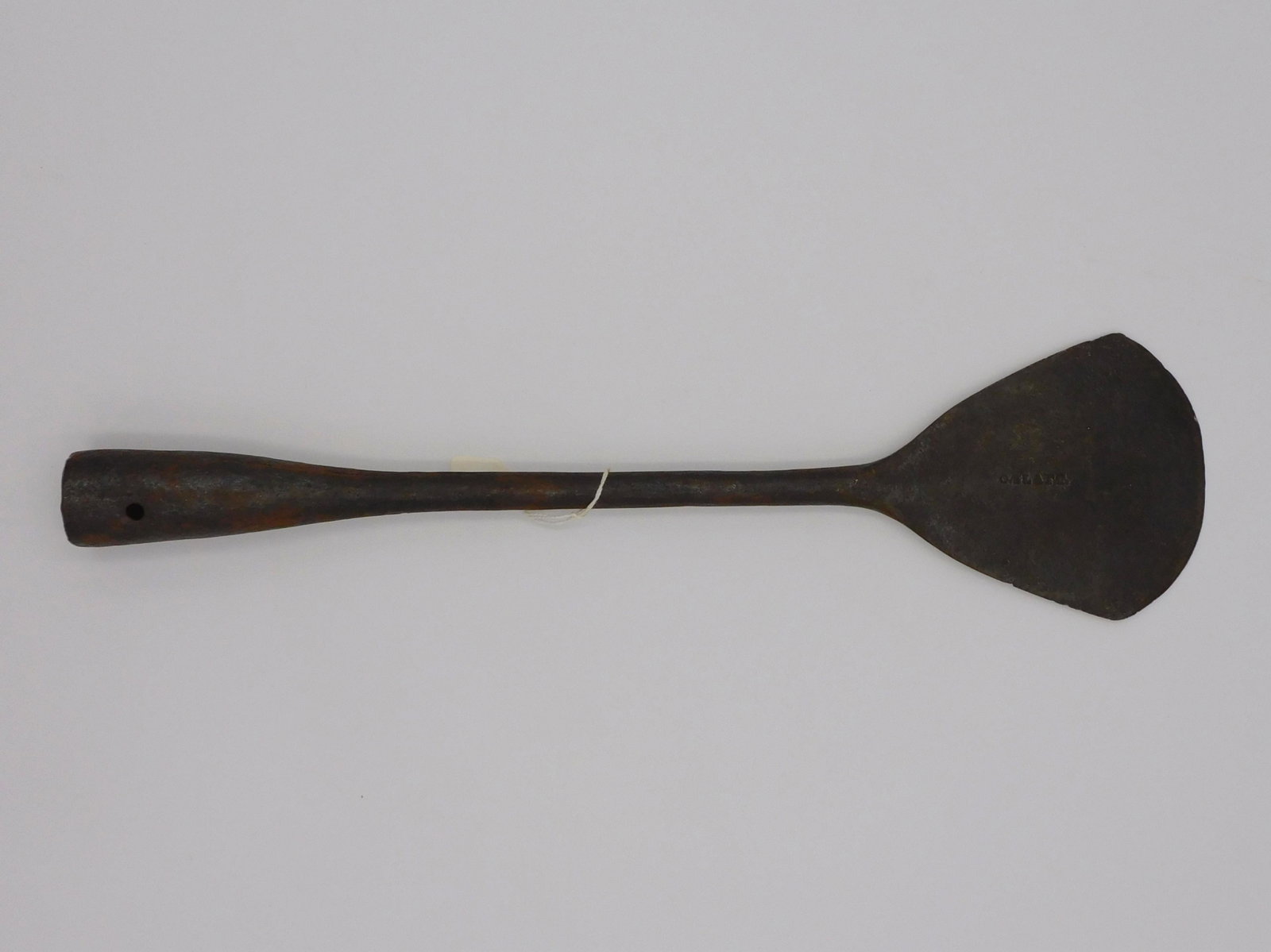 O. Slate blubber spade. 19th century. Cast steel: blubber spade made by O. Slate, a blacksmith from Long Island, New York. 19 3/4" x 5 1/4". Good overall condition with age appropriate wear