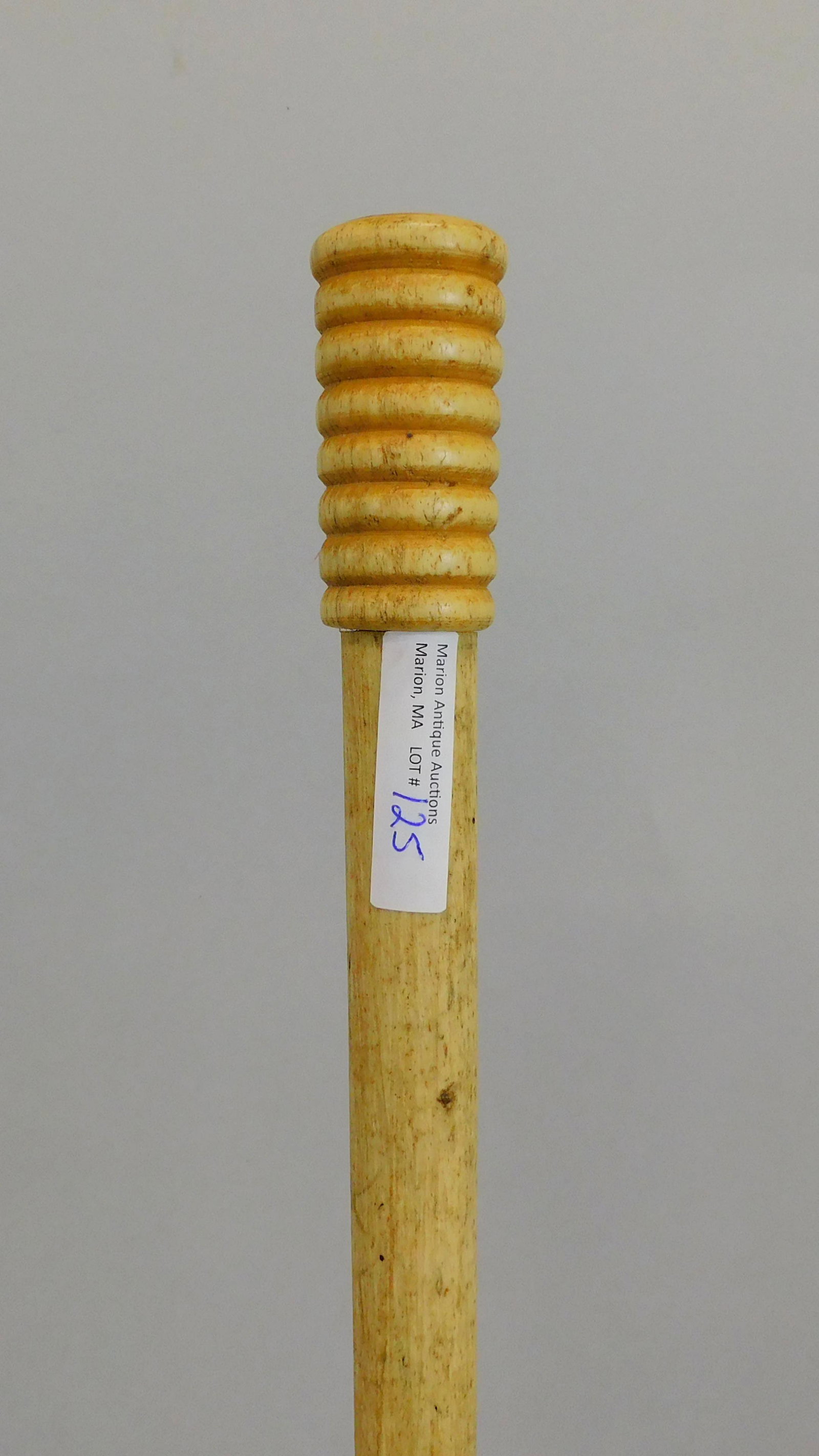 Scrimshaw walking stick. 19th century. A sailor: made folk art whalebone walking stick with turned top. 37". Good condition