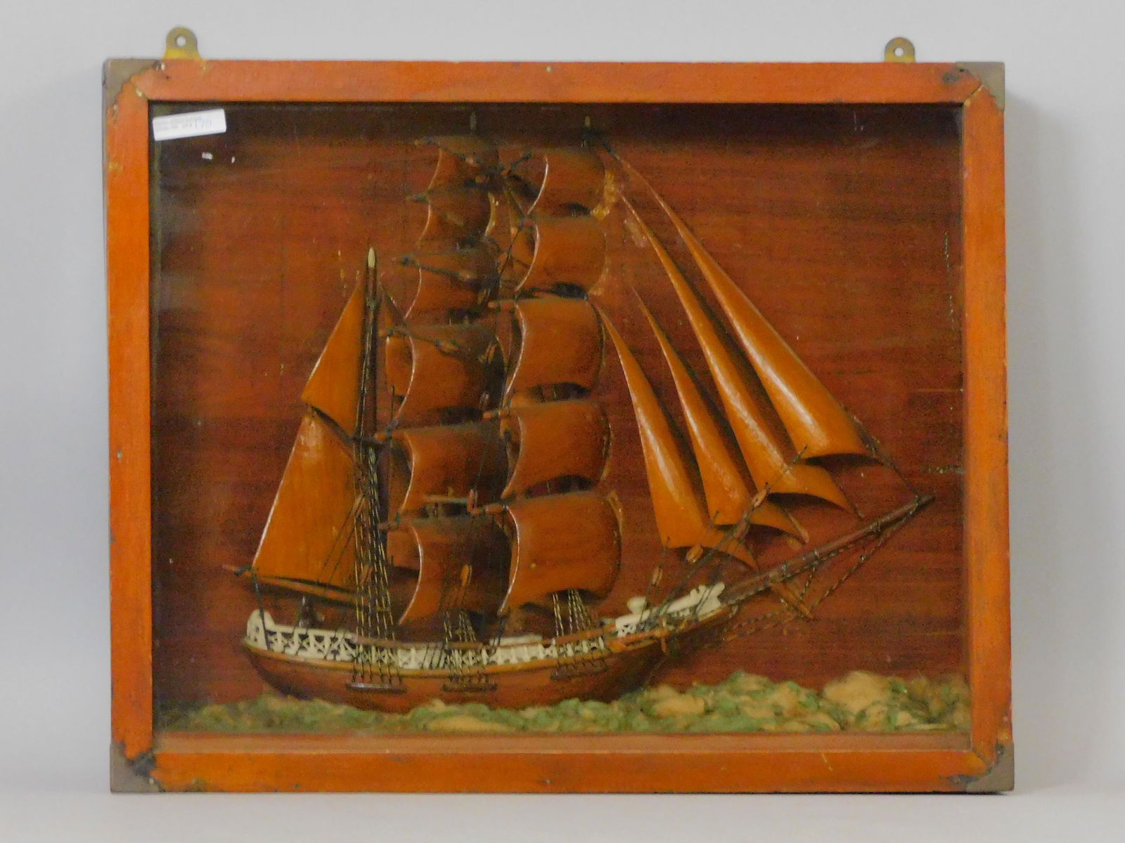 Ship diorama. Early 20th c. Depicting ship in: heavy seas, wooden sails, fully rigged. Good original condition. 18 1/4" high x 22 1/4" wide x 4 3/4" deep.