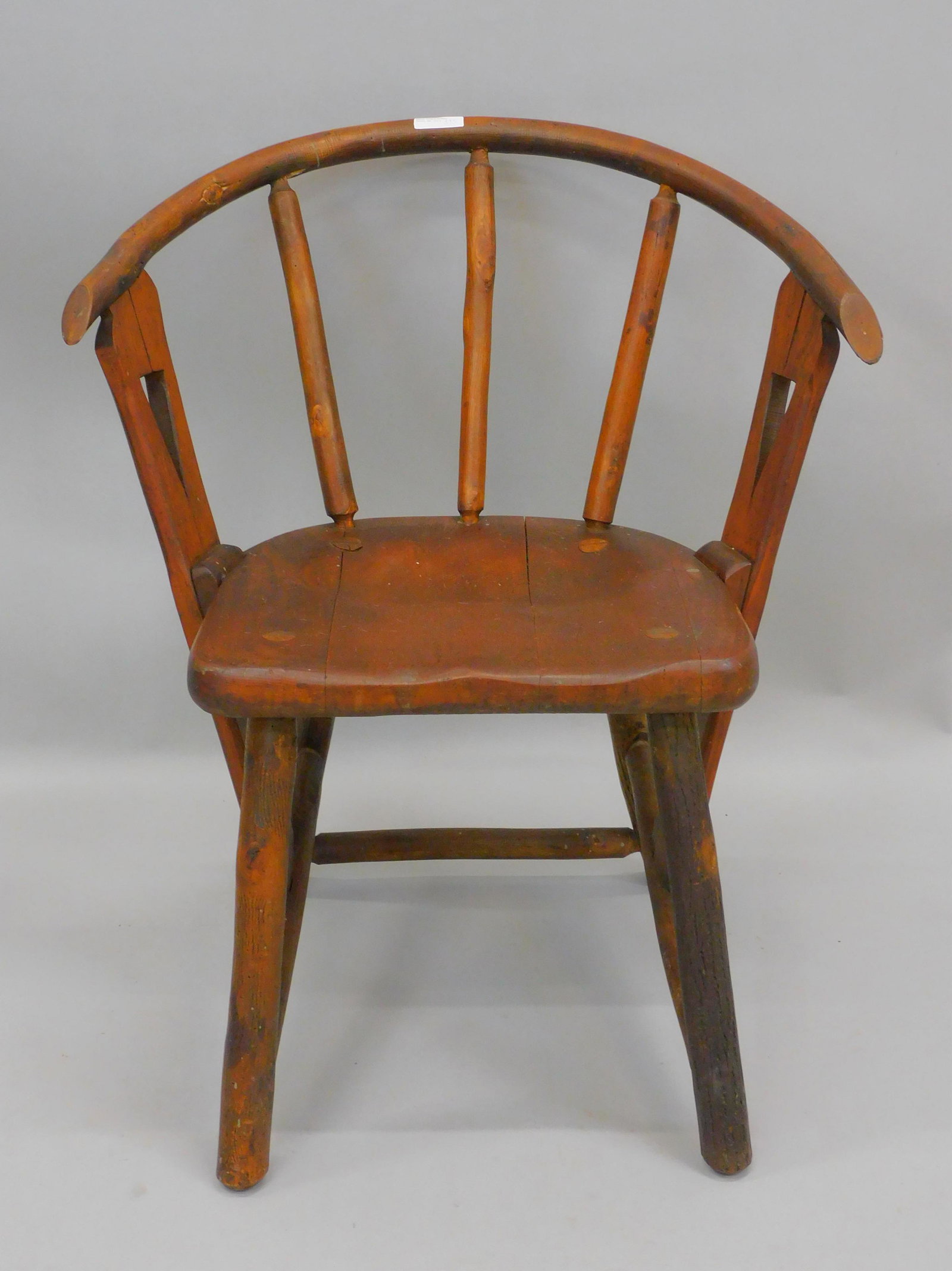 Adirondack style Old Hickory arm chair. Cut out: arm design. 30" high, 26 1/4" wide, 21" deep. 16 1/2" seat height.